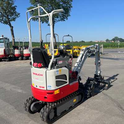 Huur een Takeuchi TB210R - Graafmachine - Image #4